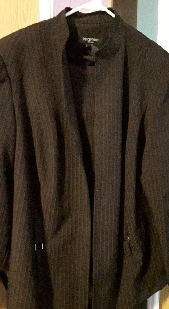 Black jacket and slacks with red pin stripes